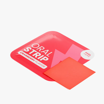 Red oral strip packaging with 'Cranberry Flavor' text on a white background
