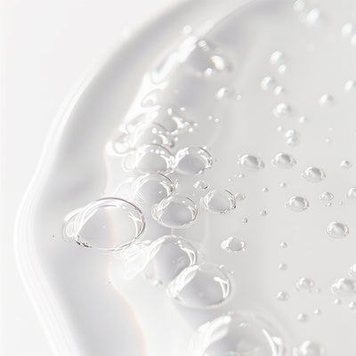 Witch Hazel Pore Perfecting Toner Clean Skincare Close-up of clear bubbles on a white surface