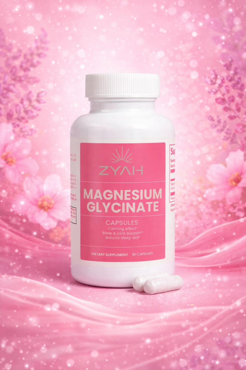 Bottle of ZYAH Magnesium Glycinate capsules on a pink floral background