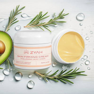 Zyah skin firming cream jar with avocado and rosemary on a light background